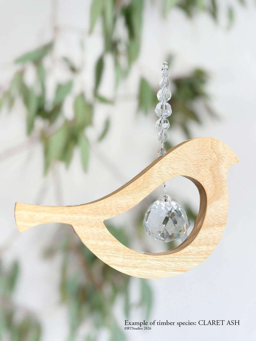 Claret ash bird tail up suncatcher – one-of-a-kind handmade timber crystal art by RT Studios Canberra