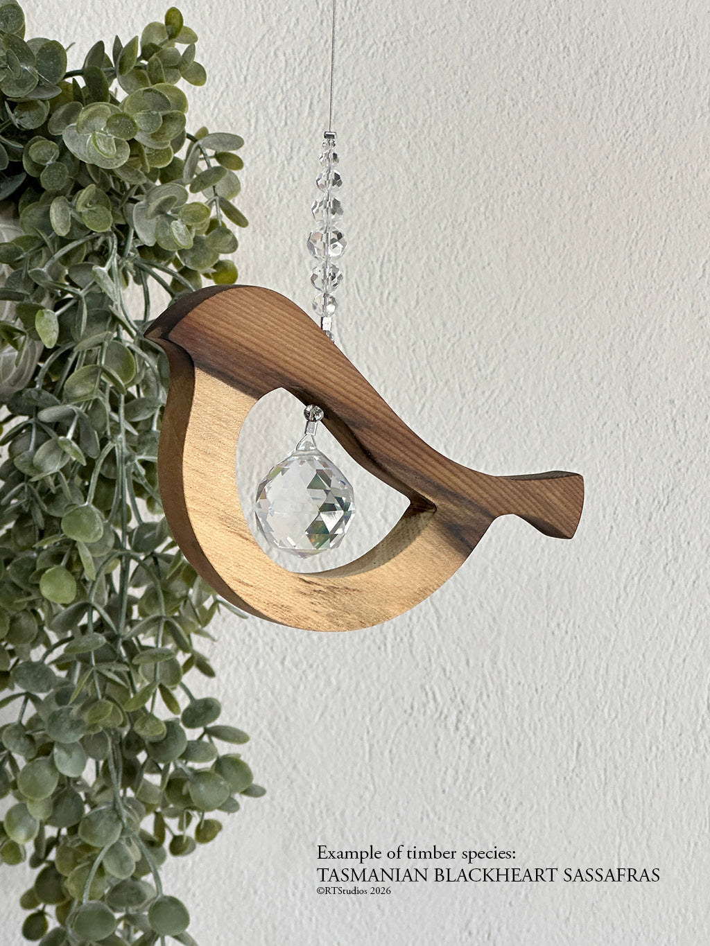 Sassafras bird tail up suncatcher – one-of-a-kind handmade timber crystal art by RT Studios Canberra