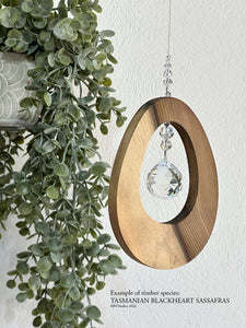 Sassafras oval suncatcher – handcrafted timber and crystal wall art by RT Studios Canberra