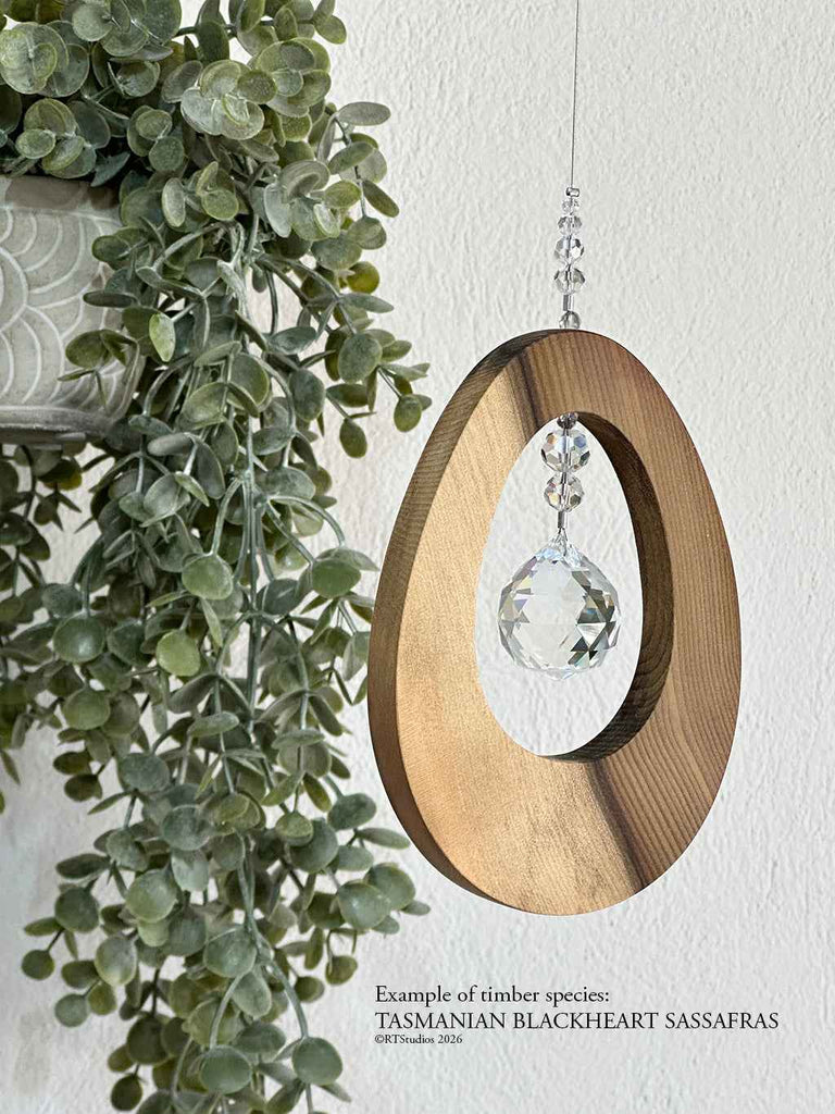 Tasmanian Blackheart Sassafras droplet suncatcher – one-of-a-kind handcrafted Australian timber wall art by RT Studios